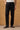 Pantalon noir pour homme en lin 100 % avec cordon de serrage et plis, coupe droite décontractée.