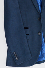 Costume trois pièces bleu marine pour homme, style œil-de-perdrix, idéal pour mariage, bal de promo, cérémonie élégante et classique.