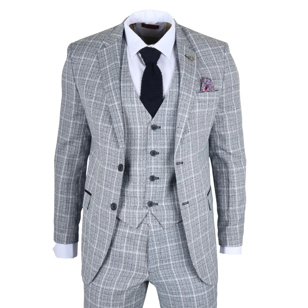 Gray checkered suit with a white shirt, black tie, and pocket square on a white background