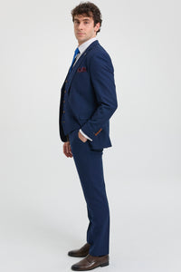 Costume trois pièces bleu marine pour homme, finitions marron, motif œil-de-perdrix classique, style vintage, idéal pour les mariés.