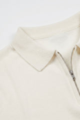 Polo homme écru en maille, col zippé, manches courtes, mélange doux