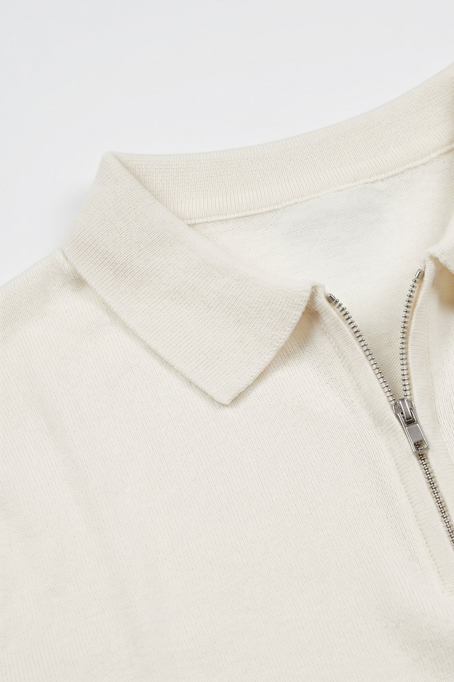 Polo homme écru en maille, col zippé, manches courtes, mélange doux