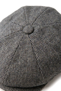 Casquette gavroche 8 panneaux pour homme, style gavroche, en tweed de laine gris.