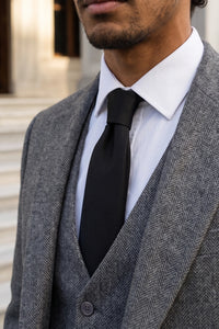 Cravate noire slim unie pour homme
