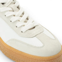 Baskets pour hommes en cuir blanc à rayures noires