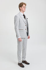 Costume trois pièces en tweed à carreaux gris pierre pour homme Mark, avec finitions marron, idéal pour les mariages et les bals de fin d'année.
